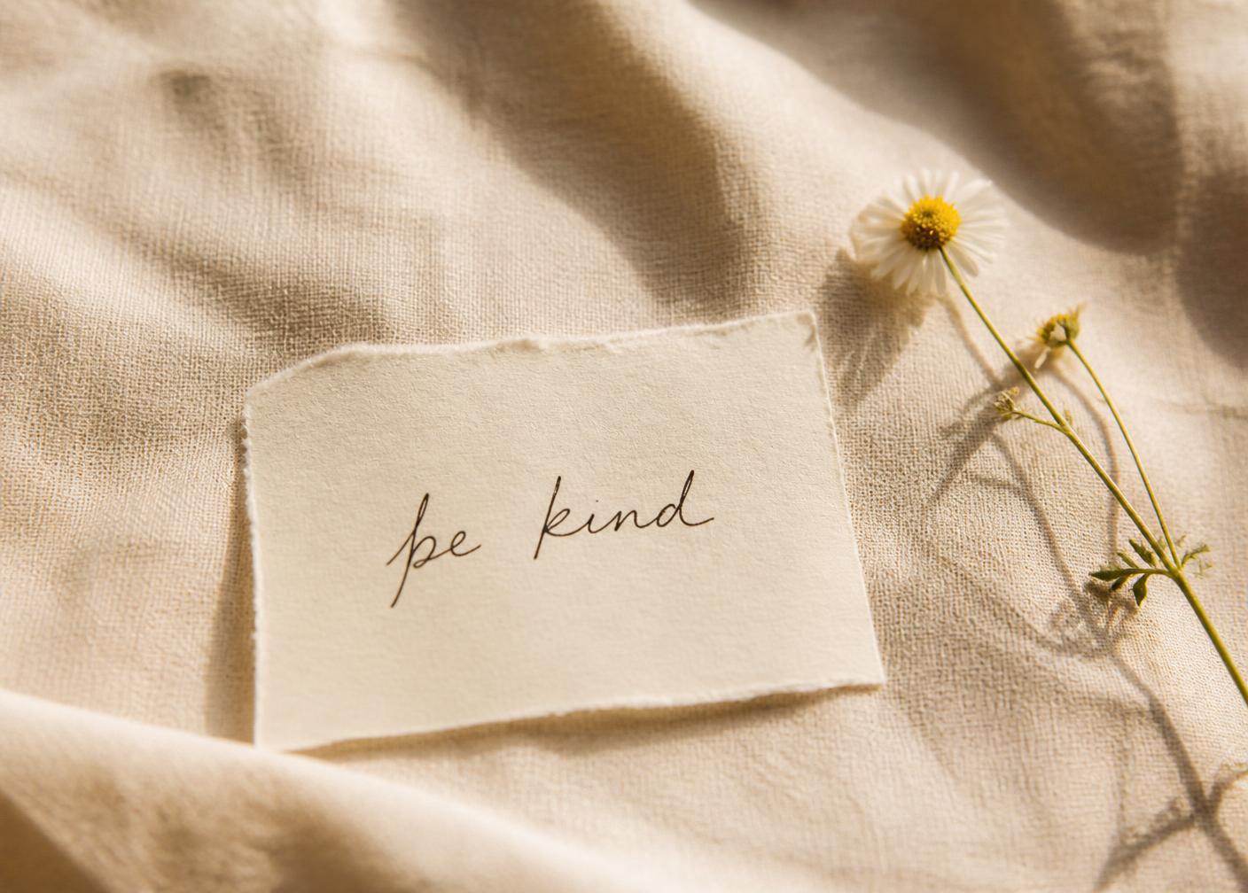 A handwritten note that says be kind